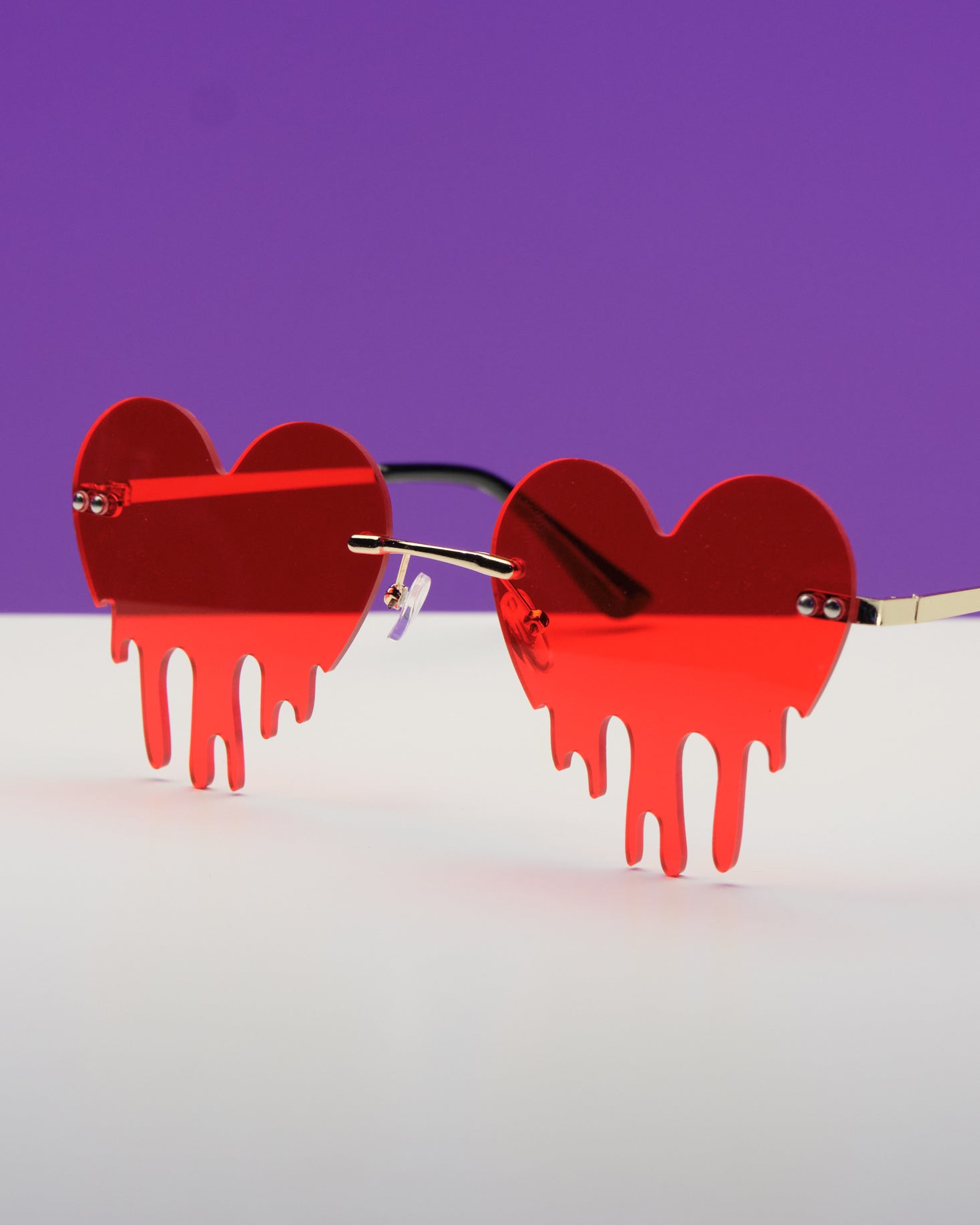 Heart store drip sunglasses